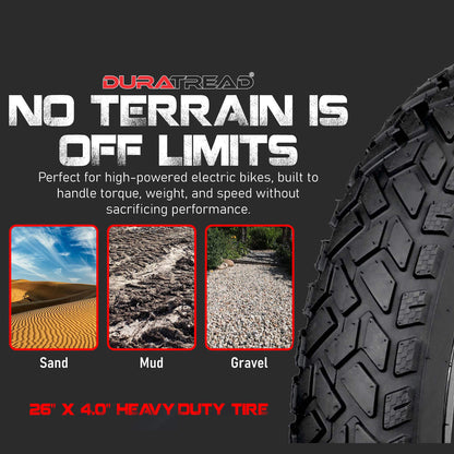 DURATREAD 26x4 fat bike tire riding on sand and beach terrain with wide stable grip.